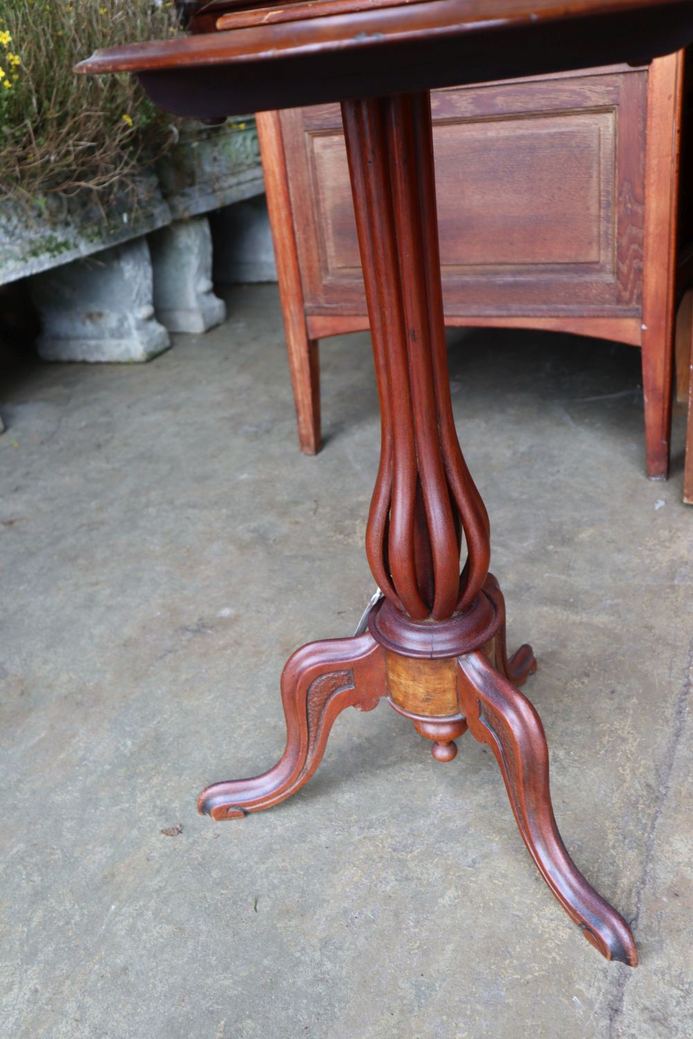 A Victorian inlaid walnut oval tripod games table, width 60cm depth 41cm height 71cm